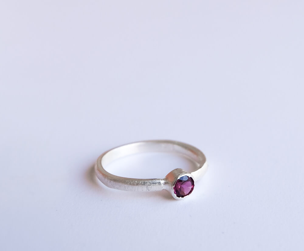 Sterling silver rings with rhodolite garnet and amethyst.