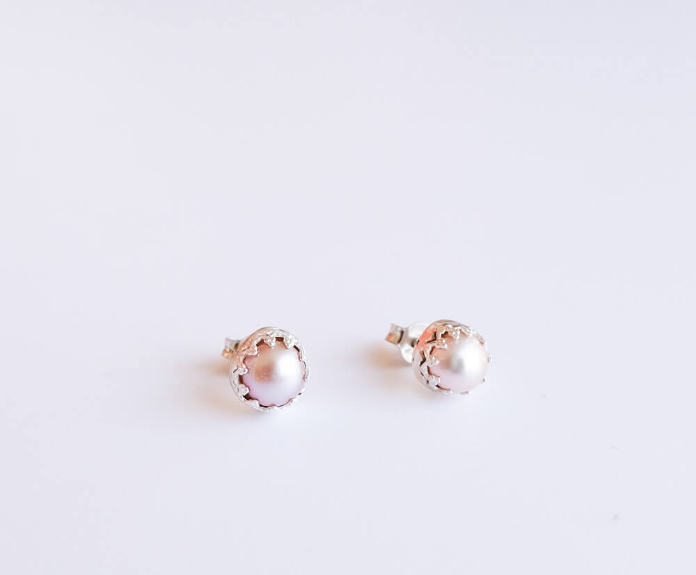 Pink pearls button earrings set in sterling silver.