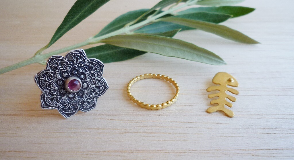 Mandala ring with pink tourmaline, gold plated silver "baubles" ring and a gold plated little fishbone.