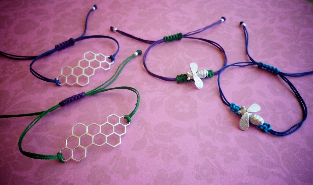 Bee and honeycomb bracelets.