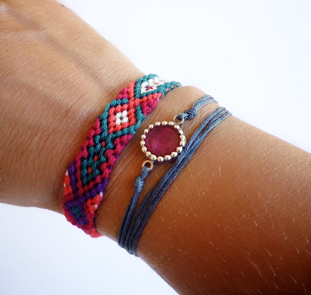 This versatile bracelet is easy to combine with more friendship bracelets or other sorts of colorful silver charm bracelets.