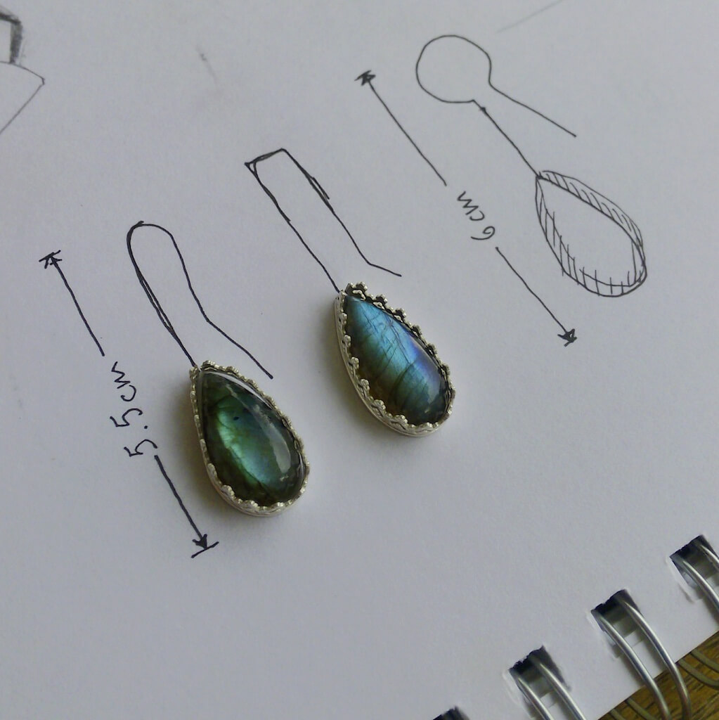 The labradorite pear cabochons will become a custom pair of earrings.